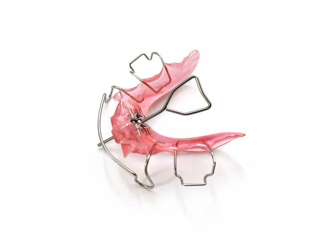 口元を指す二人のイラスト